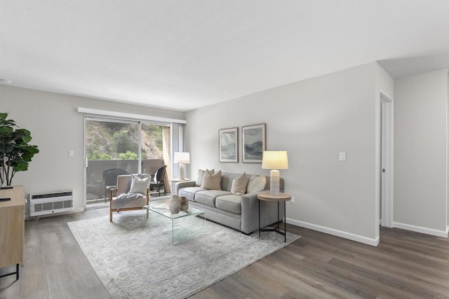6955 Alvarado Rd Unit 77, San Diego, CA 92120 - living room with wood finished floors, an AC wall unit, and baseboards
