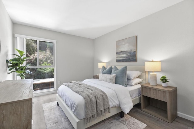 6955 Alvarado Rd Unit 77, San Diego, CA 92120 - bedroom featuring wood finished floors