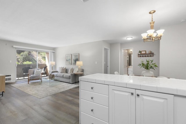 6955 Alvarado Rd Unit 77, San Diego, CA 92120 - living room with a chandelier and wood finished floors