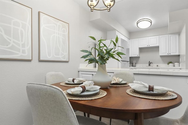 6955 Alvarado Rd Unit 77, San Diego, CA 92120 - dining area with a chandelier
