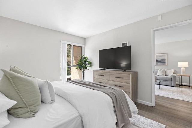 6955 Alvarado Rd Unit 77, San Diego, CA 92120 - bedroom featuring wood finished floors and baseboards