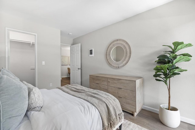 6955 Alvarado Rd Unit 77, San Diego, CA 92120 - bedroom featuring light wood finished floors and baseboards