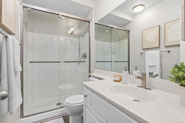 6955 Alvarado Rd Unit 77, San Diego, CA 92120 - bathroom featuring toilet, vanity, and a stall shower