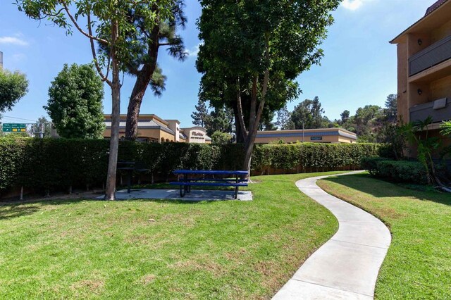 6955 Alvarado Rd Unit 77, San Diego, CA 92120 - view of yard with a patio