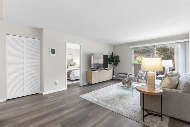 6955 Alvarado Rd Unit 77, San Diego, CA 92120 - living area featuring dark wood-style flooring and baseboards