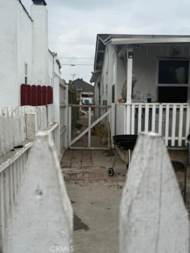 3815 Paloma St, Los Angeles, CA 90011 - view of property exterior with stucco siding