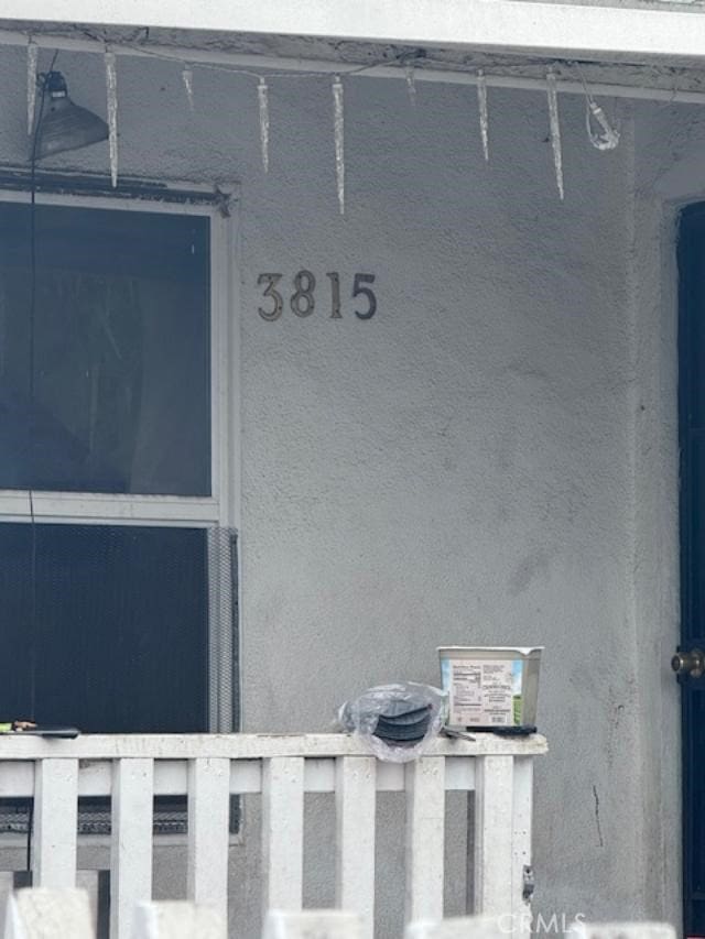 3815 Paloma St, Los Angeles, CA 90011 - exterior view of stucco siding