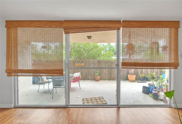 330 W California Blvd Unit 111, Pasadena, CA 91105 - entryway featuring wood-type flooring and a wall of windows