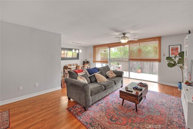 330 W California Blvd Unit 111, Pasadena, CA 91105 - living room featuring light wood finished floors, a ceiling fan, and baseboards