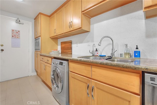 330 W California Blvd Unit 111, Pasadena, CA 91105 - kitchen featuring washer / clothes dryer, a sink, light tile patterned floors, stainless steel appliances, and light stone countertops