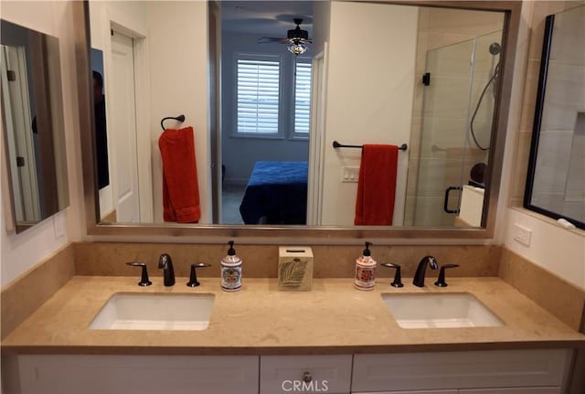 1104 Hibiscus Way, Oceanside, CA 92054 - bathroom featuring connected bathroom, double vanity, a shower stall, and a ceiling fan
