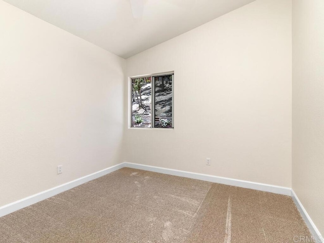 1219 Sunglow Dr, Oceanside, CA 92056 - carpeted empty room with baseboards and lofted ceiling
