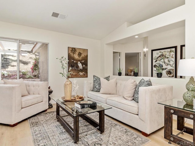 1219 Sunglow Dr, Oceanside, CA 92056 - living area with light wood-type flooring and lofted ceiling