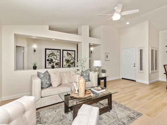 1219 Sunglow Dr, Oceanside, CA 92056 - living area featuring a ceiling fan, light wood-style flooring, baseboards, and vaulted ceiling