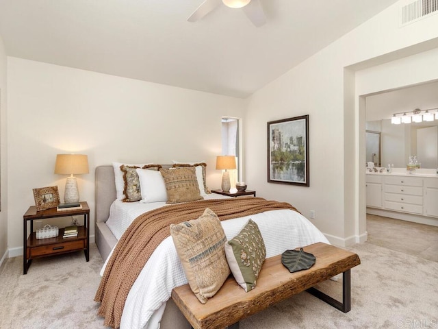 1219 Sunglow Dr, Oceanside, CA 92056 - bedroom with light colored carpet, lofted ceiling, baseboards, ensuite bathroom, and ceiling fan