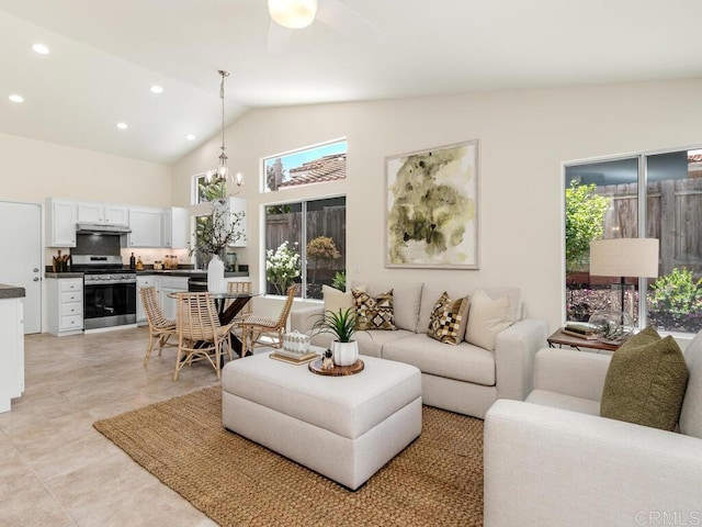 1219 Sunglow Dr, Oceanside, CA 92056 - living area featuring healthy amount of natural light, recessed lighting, a ceiling fan, and high vaulted ceiling