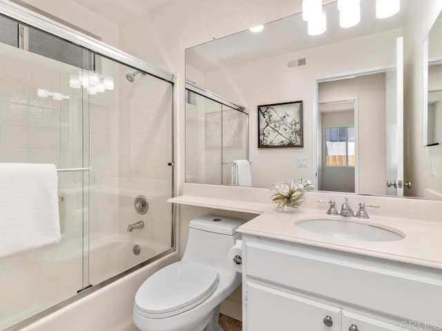 1219 Sunglow Dr, Oceanside, CA 92056 - full bathroom with bath / shower combo with glass door, vanity, and toilet