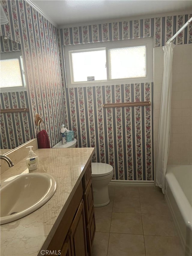 2306 S Rene Dr, Santa Ana, CA 92704 - full bath with vanity, tile patterned floors, toilet, and shower / bath combo