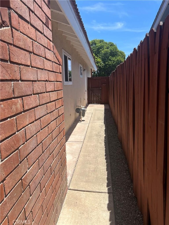 2306 S Rene Dr, Santa Ana, CA 92704 - view of side of property featuring stucco siding
