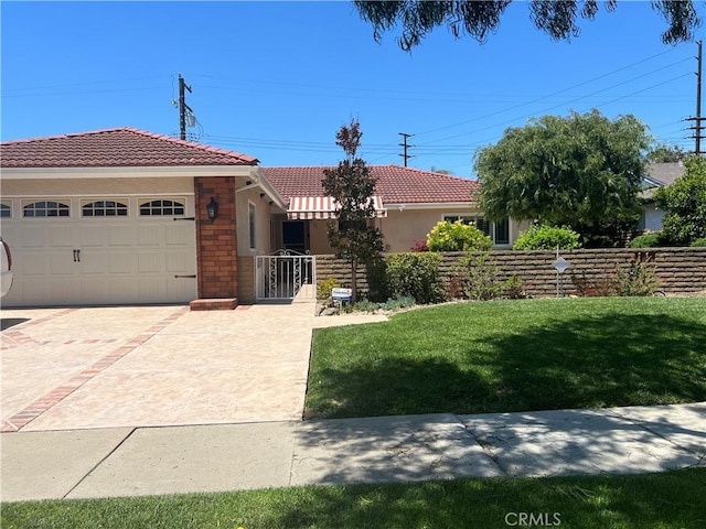 2306 S Rene Dr, Santa Ana, CA 92704 - ranch-style home featuring a tile roof, a front lawn, an attached garage, and stucco siding