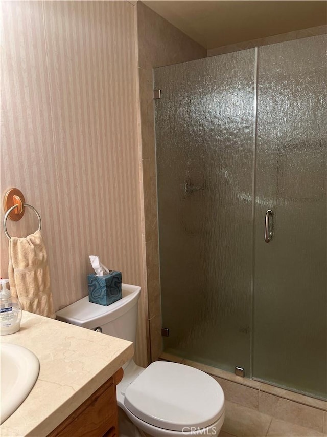 2306 S Rene Dr, Santa Ana, CA 92704 - bathroom featuring vanity, a stall shower, and toilet