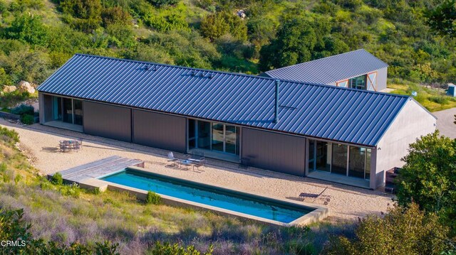 12179 Koenigstein Rd, Santa Paula, CA 93060 - back of house featuring a patio, metal roof, and an outdoor pool