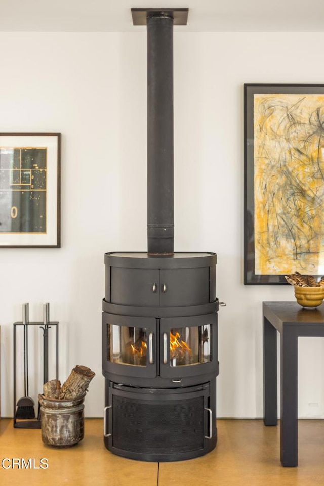 12179 Koenigstein Rd, Santa Paula, CA 93060 - detailed view of a wood stove and wood finished floors