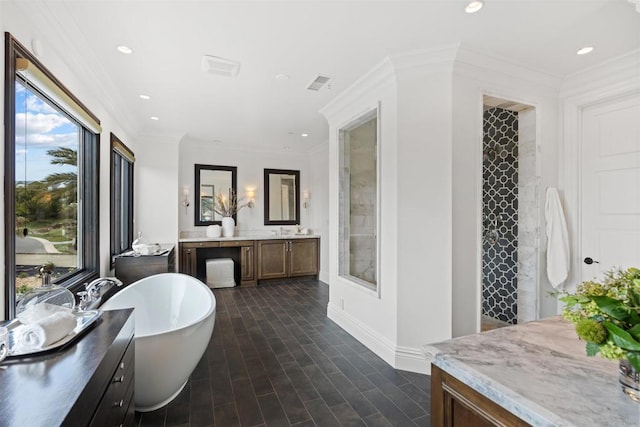 2574 Muirfields Dr, Carlsbad, CA 92009 - bathroom with healthy amount of natural light, a soaking tub, vanity, recessed lighting, and baseboards