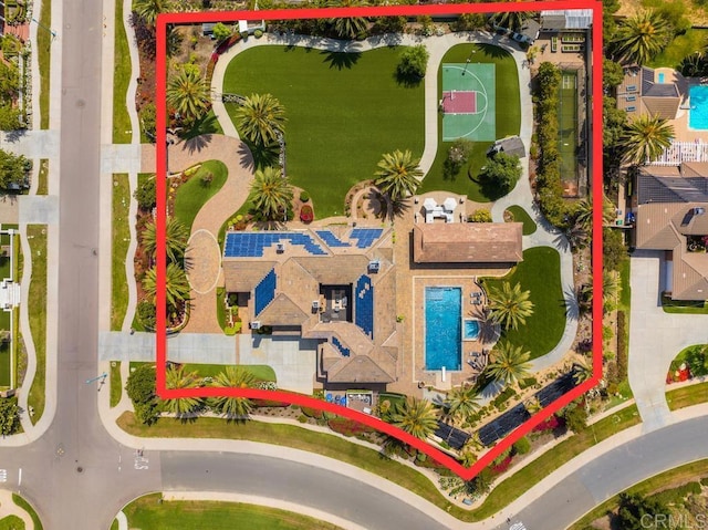 2574 Muirfields Dr, Carlsbad, CA 92009 - aerial overview of property's location with property parcel outlined and a pool area