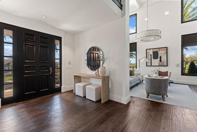 2574 Muirfields Dr, Carlsbad, CA 92009 - foyer entrance featuring baseboards, hardwood / wood-style floors, recessed lighting, and a towering ceiling