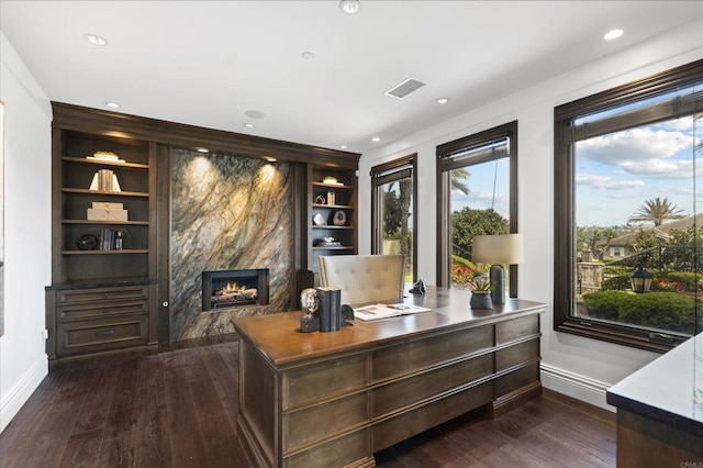 2574 Muirfields Dr, Carlsbad, CA 92009 - office featuring dark wood finished floors, a premium fireplace, built in features, and recessed lighting