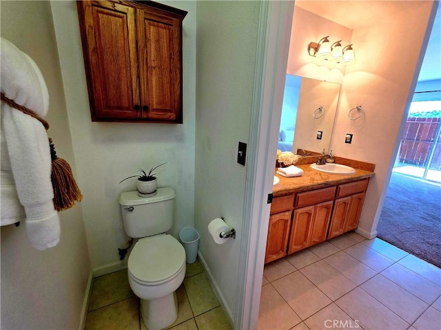 39560 S Lilley Way, Coarsegold, CA 93614 - bathroom featuring double vanity, tile patterned floors, toilet, and baseboards