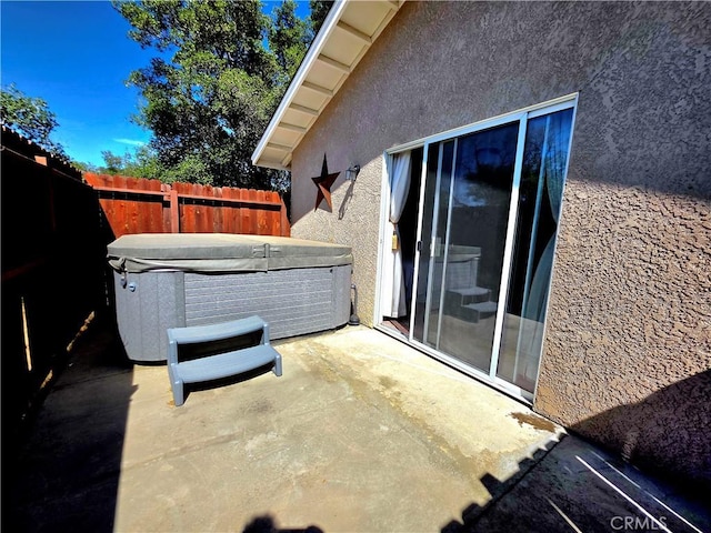 39560 S Lilley Way, Coarsegold, CA 93614 - fenced backyard with a hot tub and a patio area