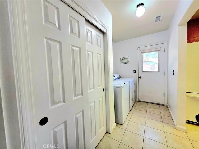 39560 S Lilley Way, Coarsegold, CA 93614 - laundry area with washer and dryer, light tile patterned floors, and baseboards