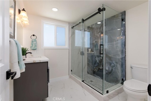 13502 Jackson St, Westminster, CA 92683 - full bath with vanity, marble finish flooring, toilet, a marble finish shower, and recessed lighting