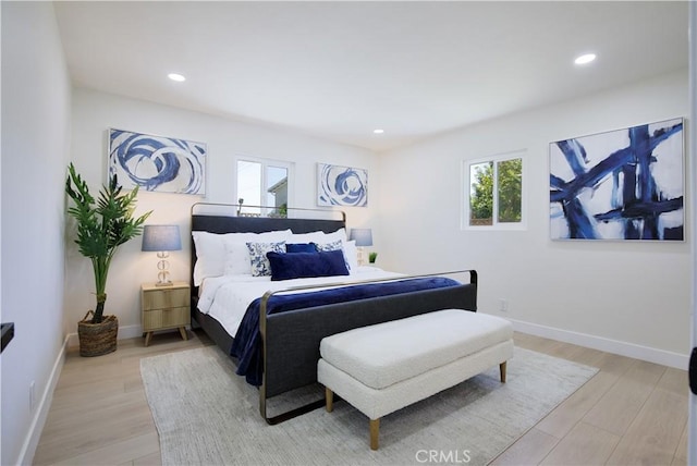 13502 Jackson St, Westminster, CA 92683 - bedroom featuring light wood finished floors, recessed lighting, and baseboards