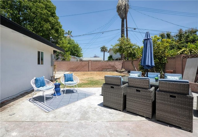 13502 Jackson St, Westminster, CA 92683 - fenced backyard with a patio and outdoor dining space