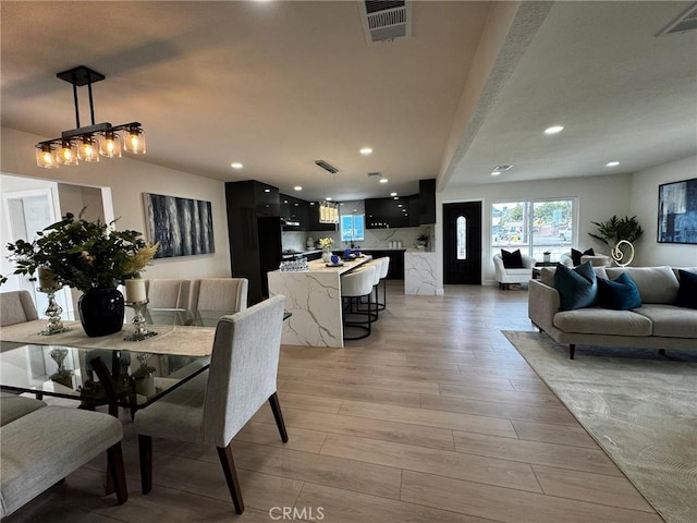13502 Jackson St, Westminster, CA 92683 - dining area with recessed lighting and light wood-style flooring