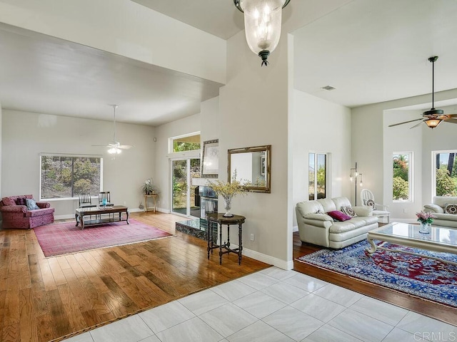 10237 High Mountain Dr, Escondido, CA 92026 - living area featuring ceiling fan, a high ceiling, and wood finished floors