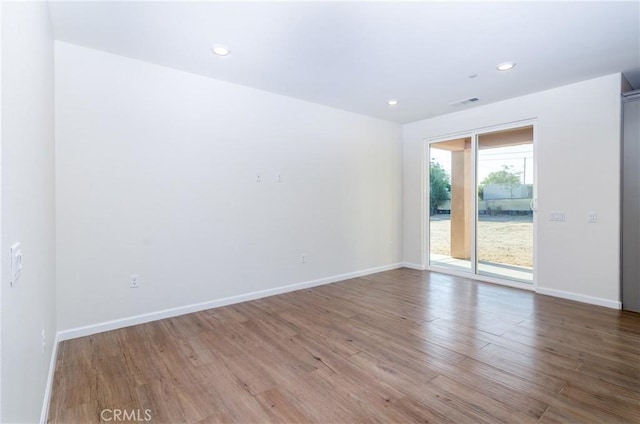 21402 Short Ridge Ave, Perris, CA 92570 - empty room featuring wood finished floors, baseboards, and recessed lighting