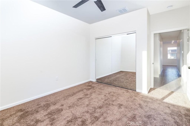 21402 Short Ridge Ave, Perris, CA 92570 - unfurnished bedroom featuring carpet, a closet, baseboards, and ceiling fan