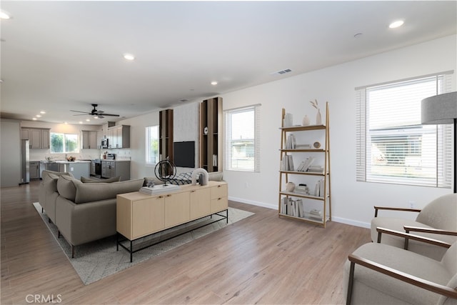 21402 Short Ridge Ave, Perris, CA 92570 - living room with recessed lighting, baseboards, light wood finished floors, and ceiling fan