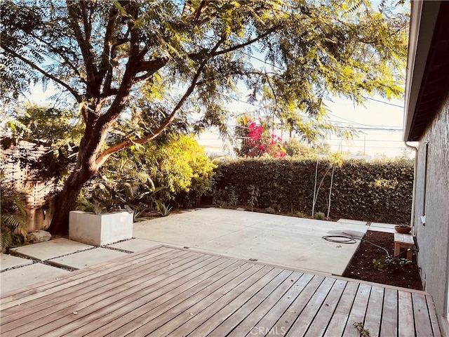 16921 Lanark St, Van Nuys, CA 91406 - wooden terrace featuring a patio area and a fenced backyard