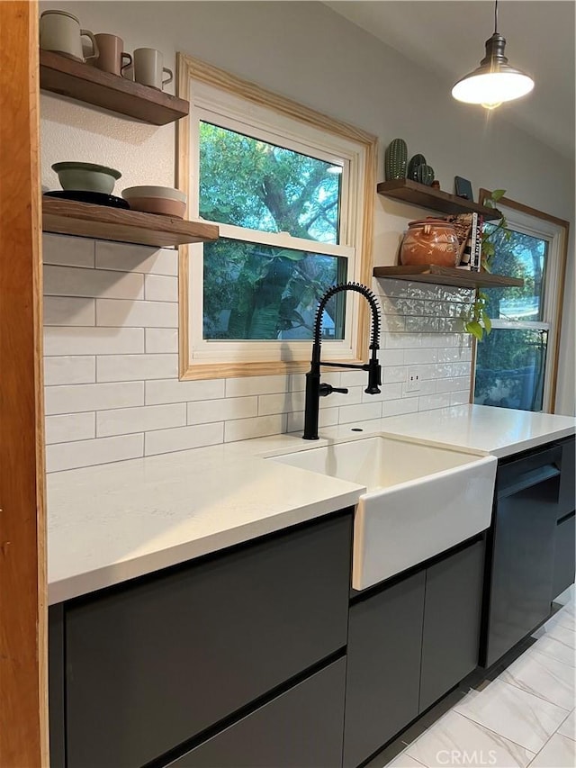 16921 Lanark St, Van Nuys, CA 91406 - kitchen with open shelves, a sink, decorative backsplash, black dishwasher, and light countertops