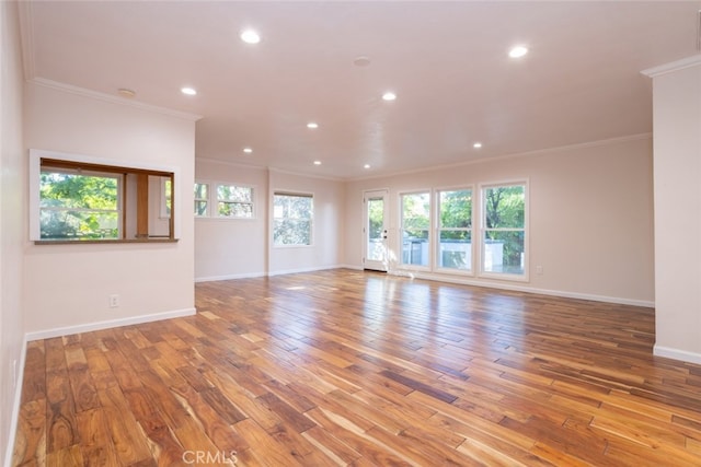 16921 Lanark St, Van Nuys, CA 91406 - spare room featuring ornamental molding, recessed lighting, hardwood / wood-style floors, and baseboards