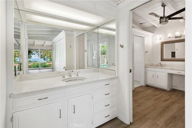 360 Via Almar, Palos Verdes Estates, CA 90274 - bathroom featuring healthy amount of natural light, vanity, beam ceiling, ceiling fan, and wood finished floors