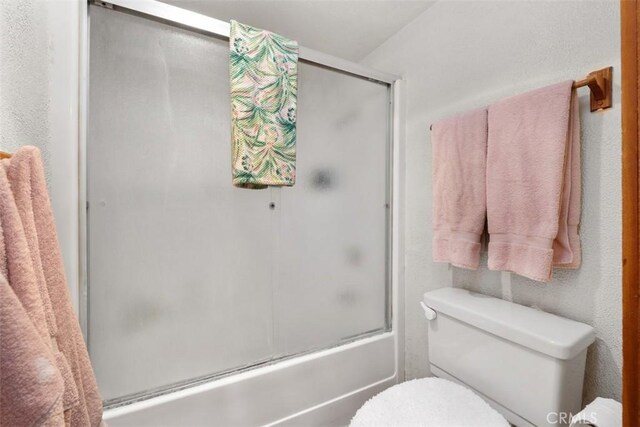 31531 Via Conejo Unit 153, Coto De Caza, CA 92679 - bathroom with enclosed tub / shower combo and toilet