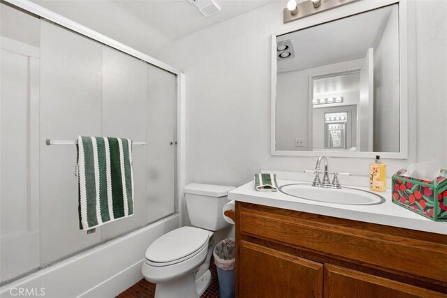 31531 Via Conejo Unit 153, Coto De Caza, CA 92679 - full bathroom with vanity, shower / bath combination with glass door, and toilet