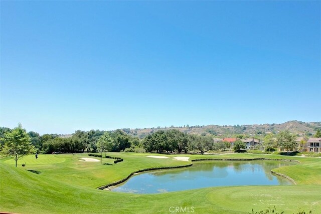 31531 Via Conejo Unit 153, Coto De Caza, CA 92679 - view of property's community featuring a water view, golf course view, and a lawn
