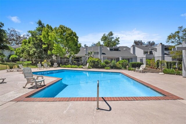 31531 Via Conejo Unit 153, Coto De Caza, CA 92679 - community pool featuring a patio area and a residential view